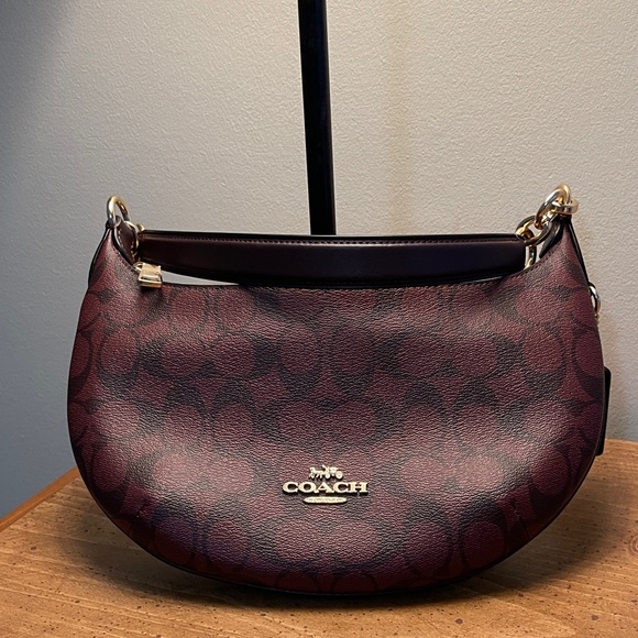 Coach Handbags - NWOT has Coach Oxblood Red Payton Hobo Signature Canvas